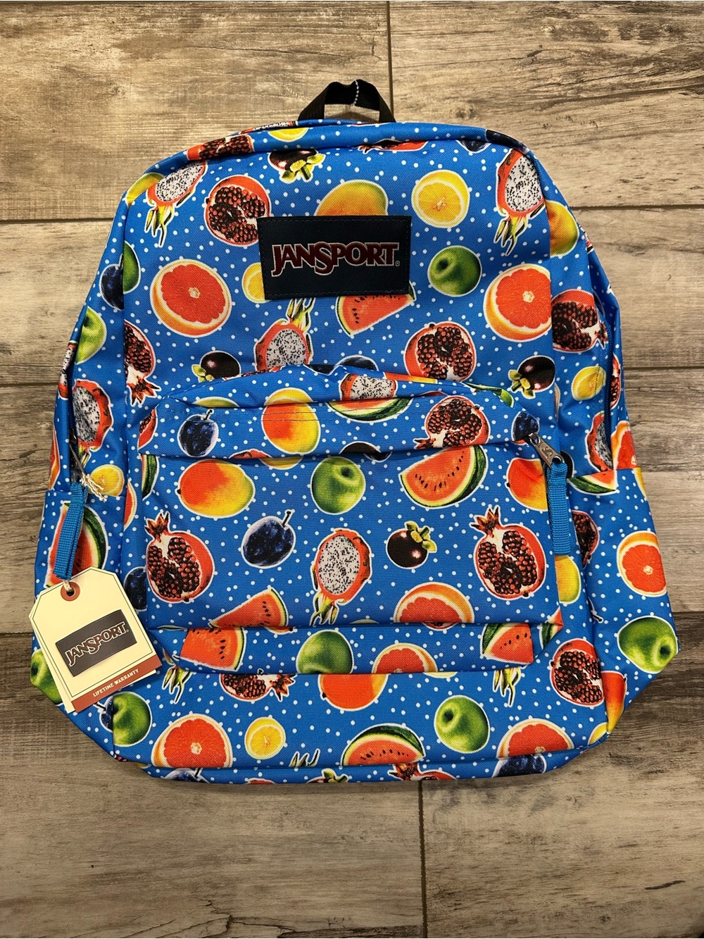 Jansport Blue Backpack with Colorful Fruit Print